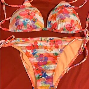I am selling a Hawaiian flower swimming suit